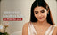 Modern Indian woman receiving an anniversary American diamond jewellery gift from Nuyug