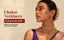 Indian model wearing a pearl and ruby choker necklace set with matching earrings — Nuyug choker banner