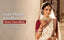 Bengali bride in ivory Banarasi saree with maroon blouse wearing a Nuyug antique-gold polki bridal necklace, matching jhumka and maang tikka that won't tarnish or turn black