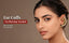 Indian model wearing a no-piercing gold-toned peacock ear cuff — Nuyug ear cuff banner