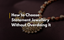 Gold motif necklace and an earring laying on a brown surface with overlay text “How to Choose Statement Jewellery Without Overdoing It.”