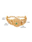 A gold-toned heritage bracelet featuring layered pearls, intricate kundan floral motifs, and a striking green stone centre piece