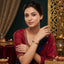 NUYUG Mangalsutra Bracelet for Women 22K Gold Plated Brass Four-Petal Kundan Centre with Double Strands of Black Beads